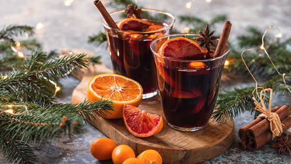 Two Glasses of Christmas hot mulled wine with spices